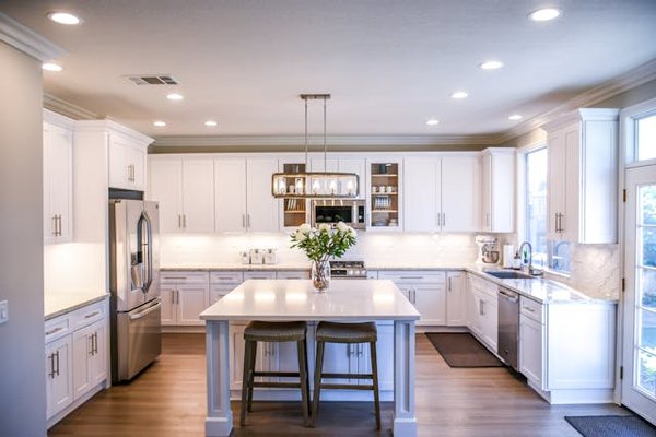What are the innovative ways to integrate a refrigerator into your kitchen design?